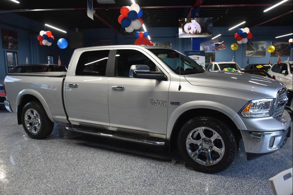 used 2018 Ram 1500 car, priced at $28,981