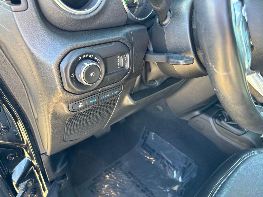 used 2023 Jeep Wrangler 4xe car, priced at $29,827