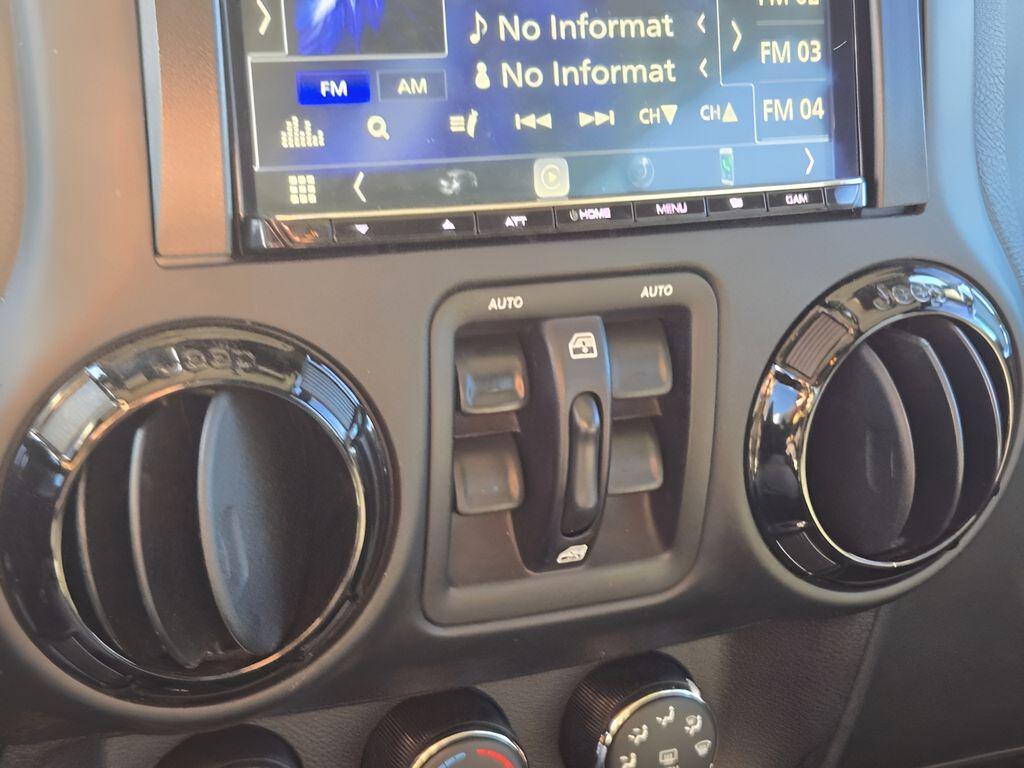 used 2016 Jeep Wrangler Unlimited car, priced at $19,394