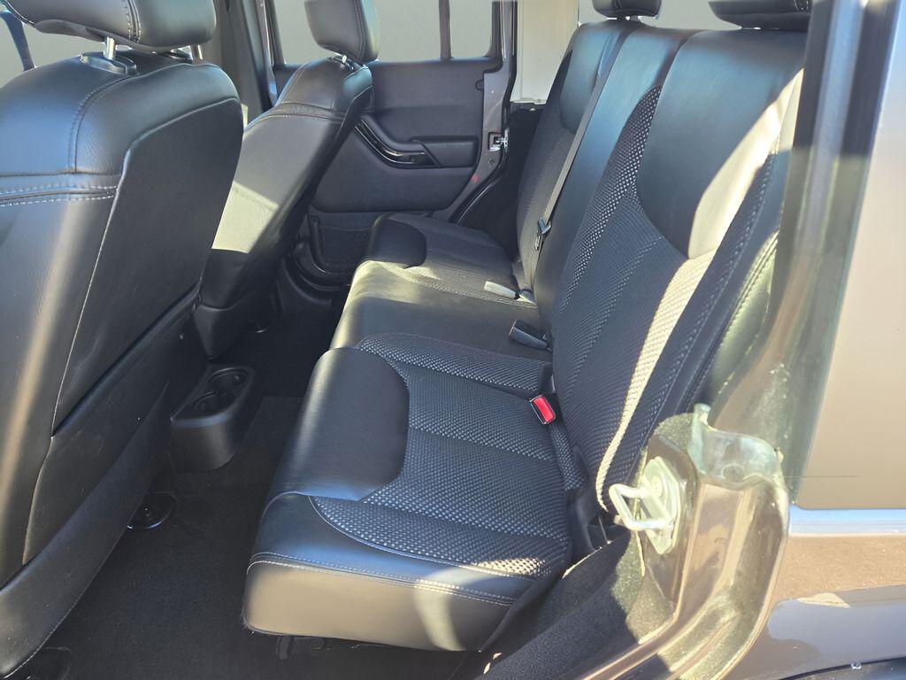 used 2016 Jeep Wrangler Unlimited car, priced at $19,394