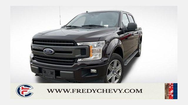 used 2019 Ford F-150 car, priced at $23,004