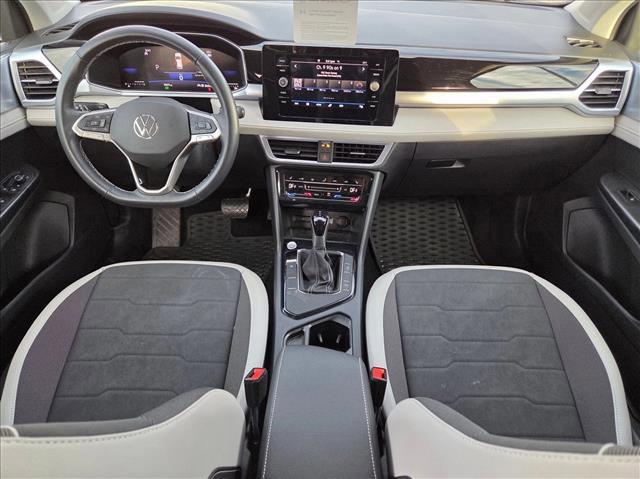 used 2025 Volkswagen Taos car, priced at $27,499