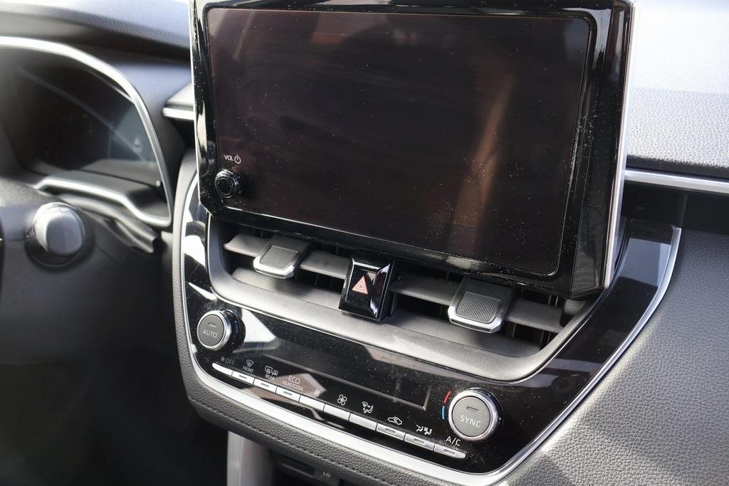 used 2023 Toyota Corolla Cross Hybrid car, priced at $31,995