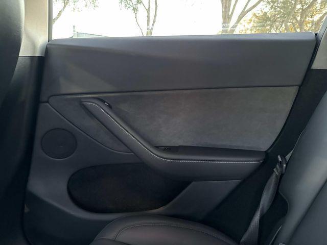 used 2025 Tesla Model Y car, priced at $38,288