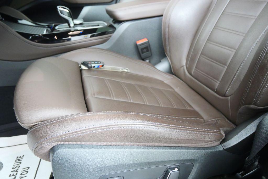 used 2024 BMW X4 car, priced at $53,688