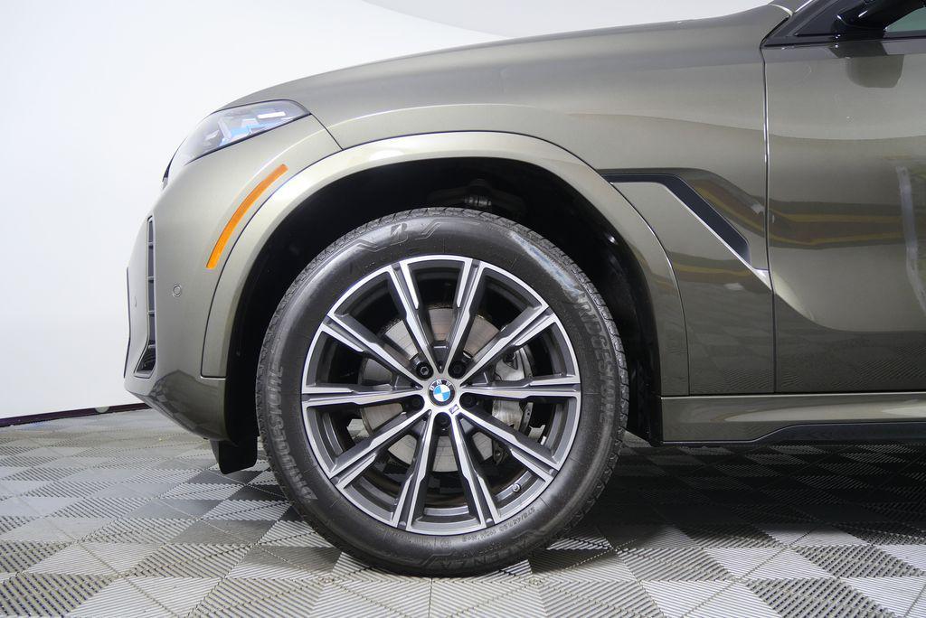 used 2025 BMW X6 car, priced at $67,981