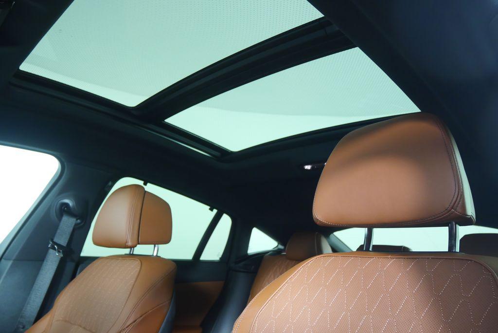 used 2024 BMW X6 car, priced at $72,944