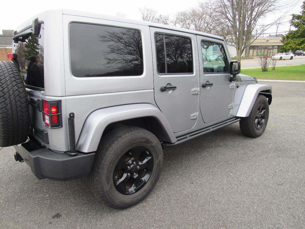 used 2015 Jeep Wrangler Unlimited car, priced at $13,500