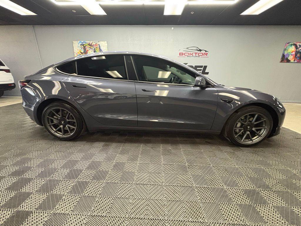 used 2023 Tesla Model 3 car, priced at $24,498