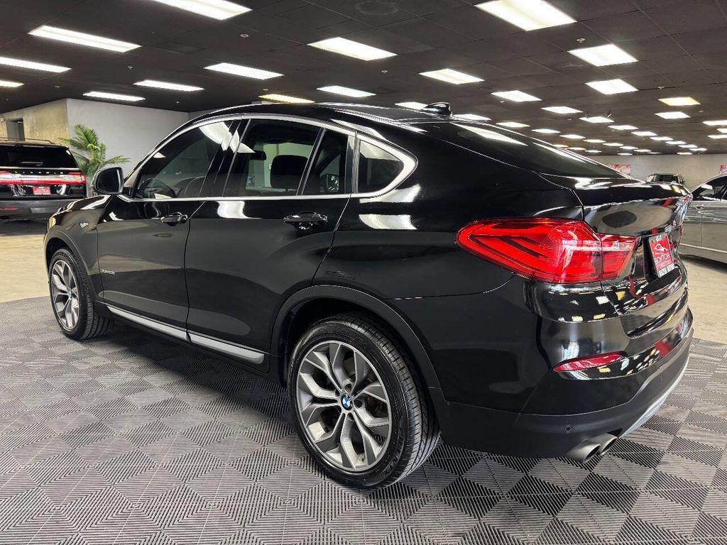 used 2016 BMW X4 car, priced at $14,399