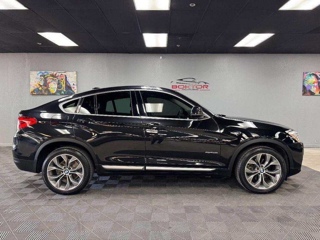 used 2016 BMW X4 car, priced at $14,399