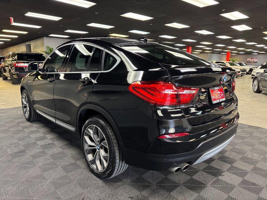 used 2016 BMW X4 car, priced at $14,399