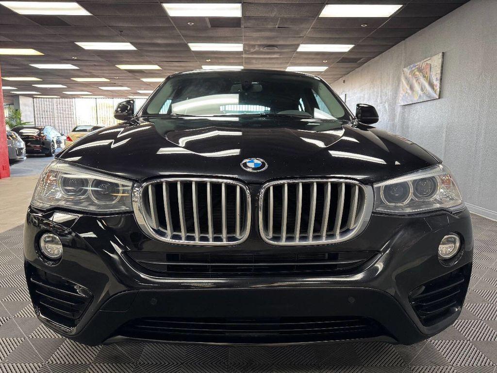 used 2016 BMW X4 car, priced at $14,399