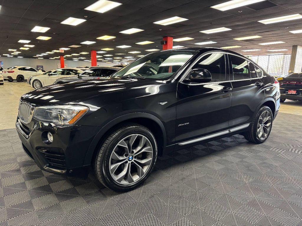 used 2016 BMW X4 car, priced at $14,399