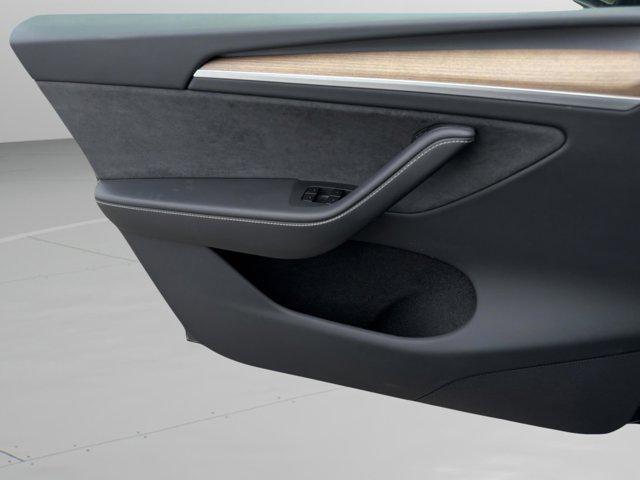 used 2025 Tesla Model Y car, priced at $35,052