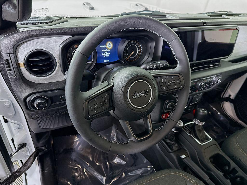 used 2025 Jeep Wrangler car, priced at $39,885
