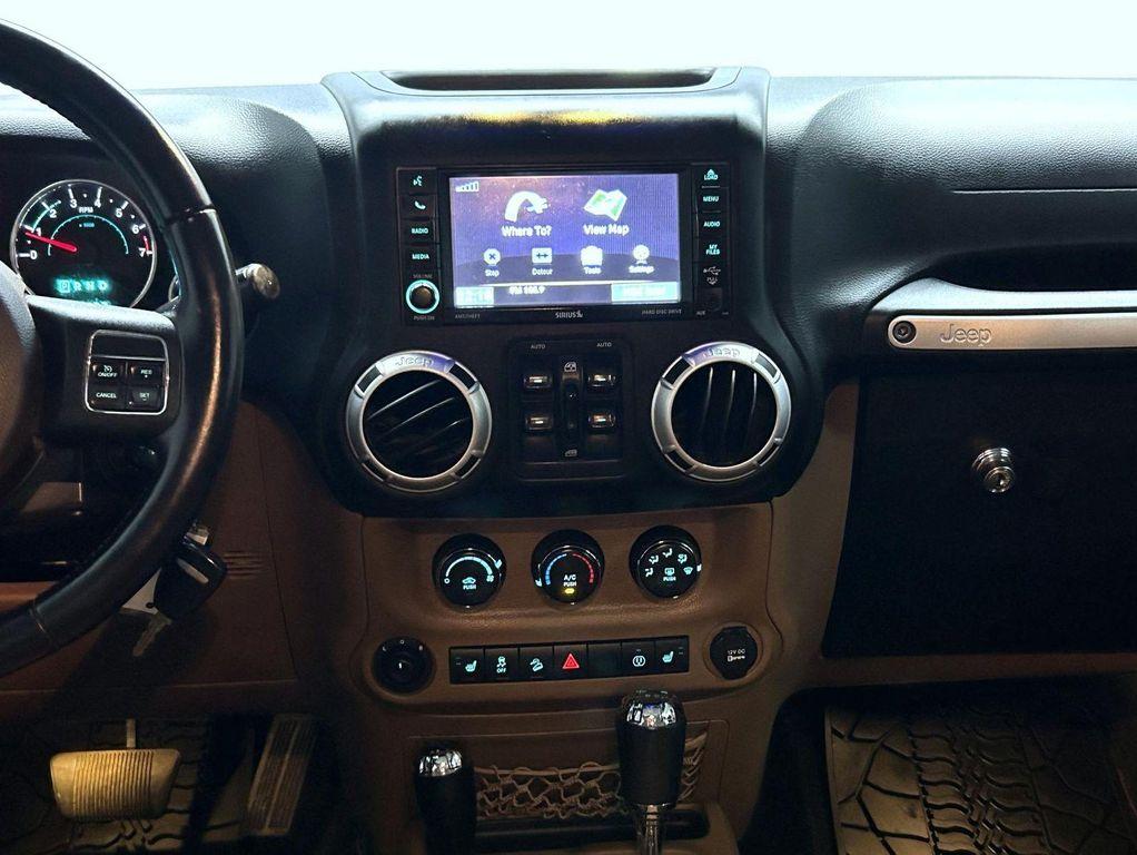 used 2013 Jeep Wrangler Unlimited car, priced at $16,167
