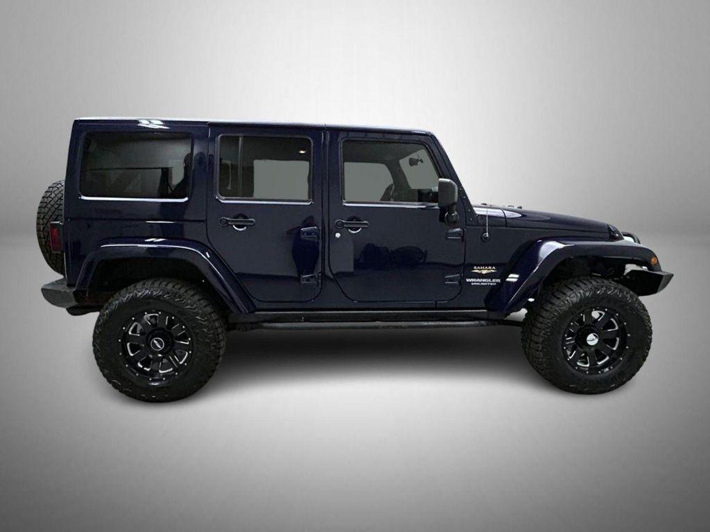 used 2013 Jeep Wrangler Unlimited car, priced at $16,167