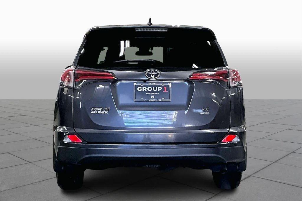used 2018 Toyota RAV4 car, priced at $15,987