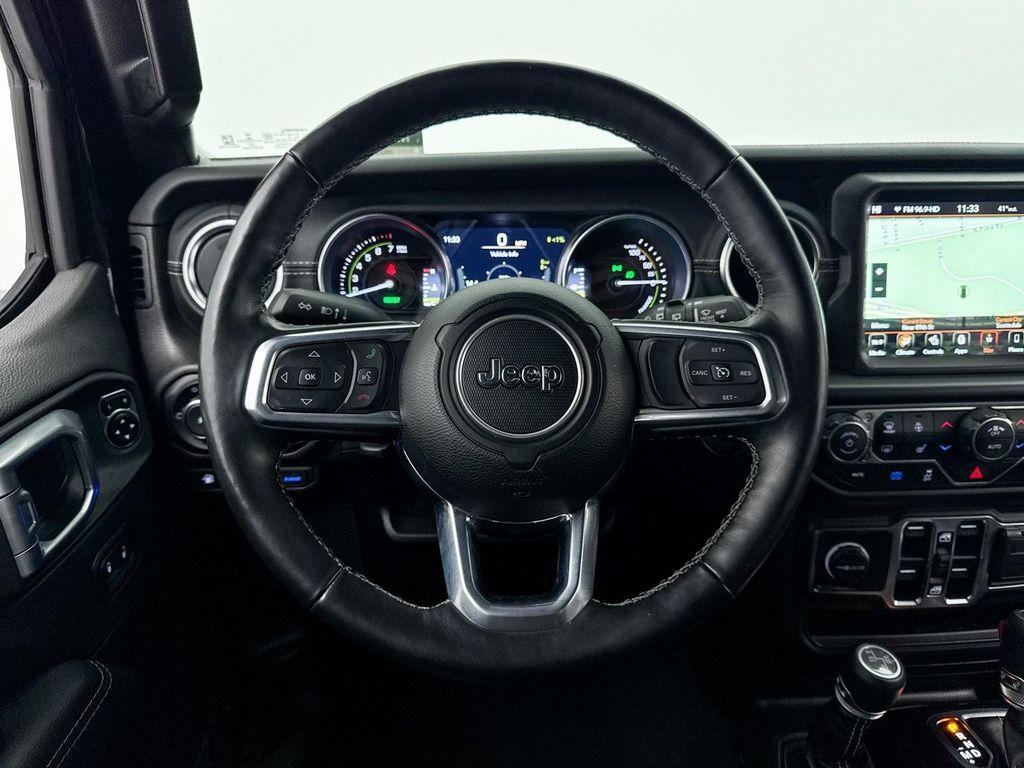 used 2023 Jeep Wrangler 4xe car, priced at $29,594