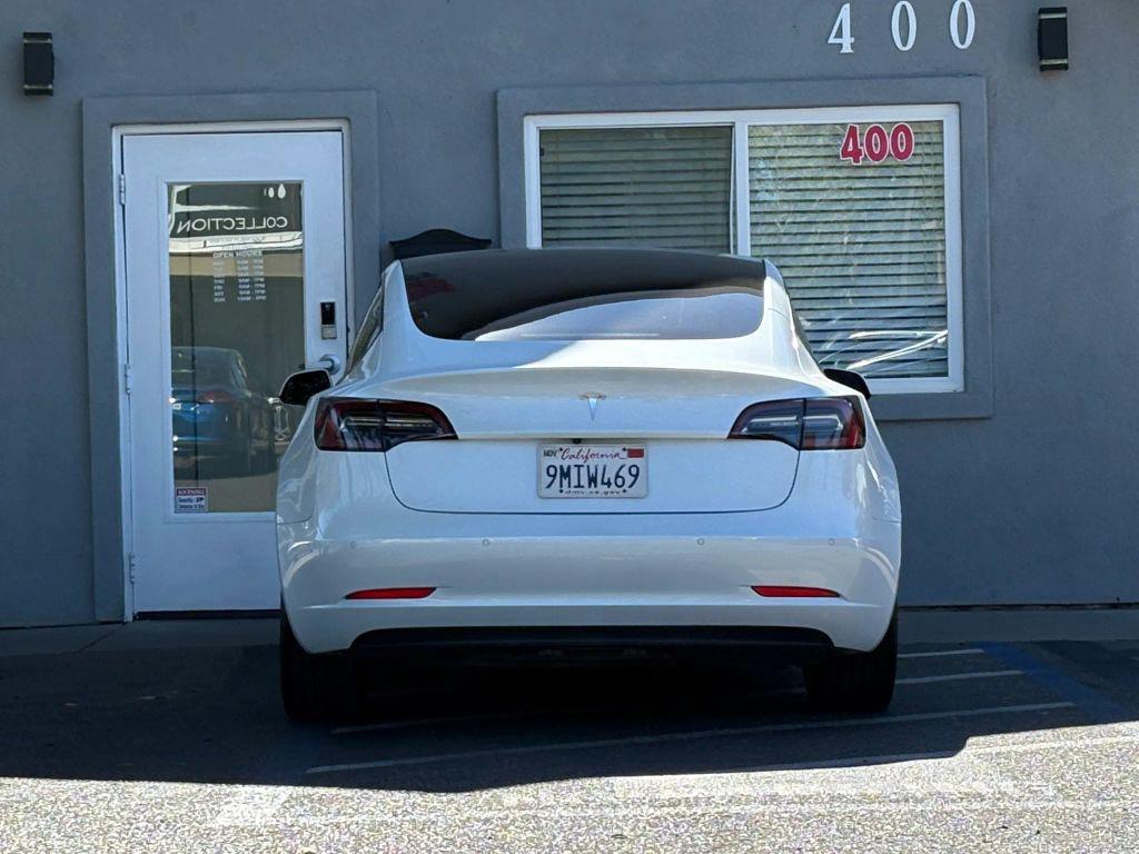used 2021 Tesla Model 3 car, priced at $18,999