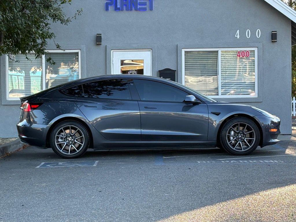 used 2022 Tesla Model 3 car, priced at $18,799