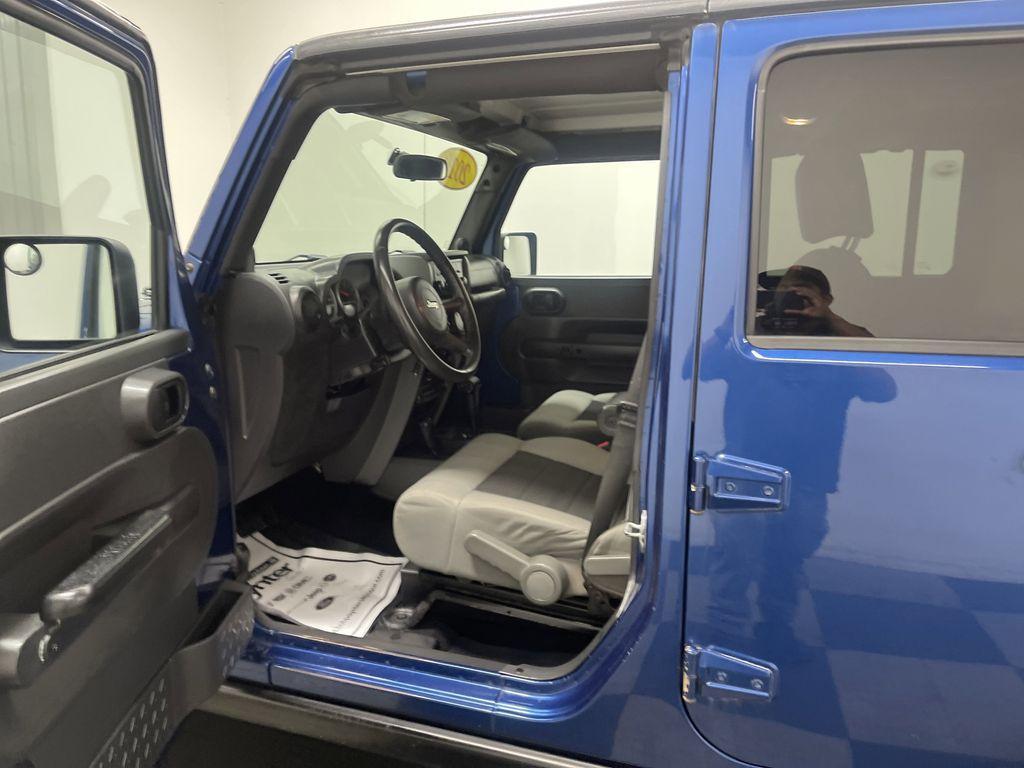 used 2010 Jeep Wrangler Unlimited car, priced at $10,999