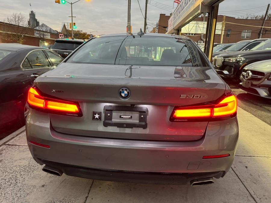 used 2023 BMW 530e car, priced at $29,999