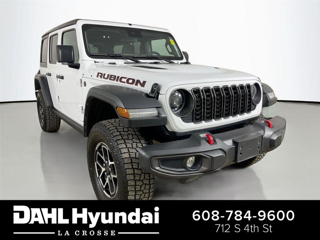 used 2024 Jeep Wrangler car, priced at $35,590