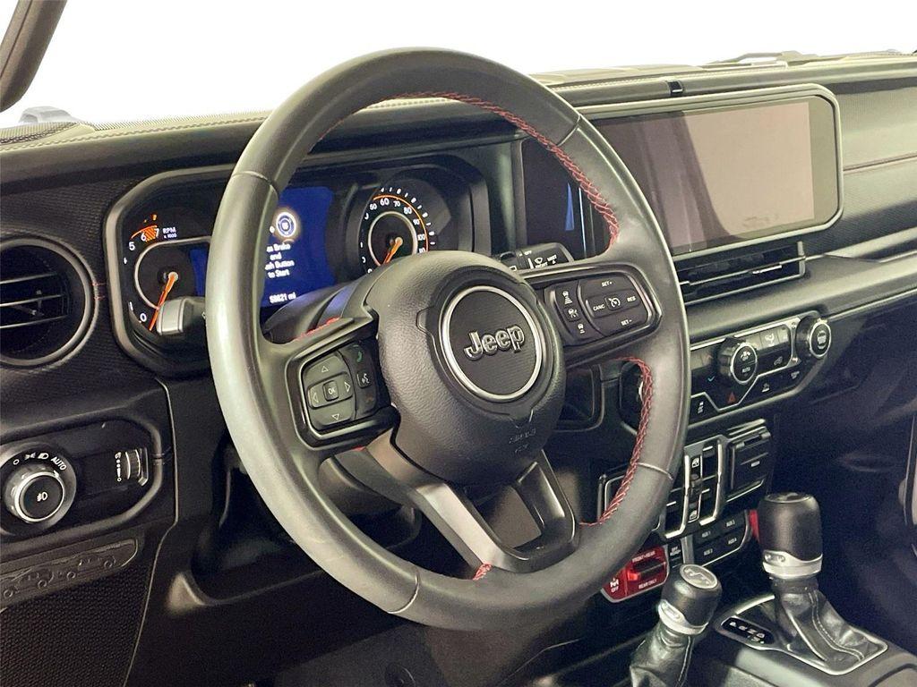 used 2024 Jeep Wrangler car, priced at $35,590