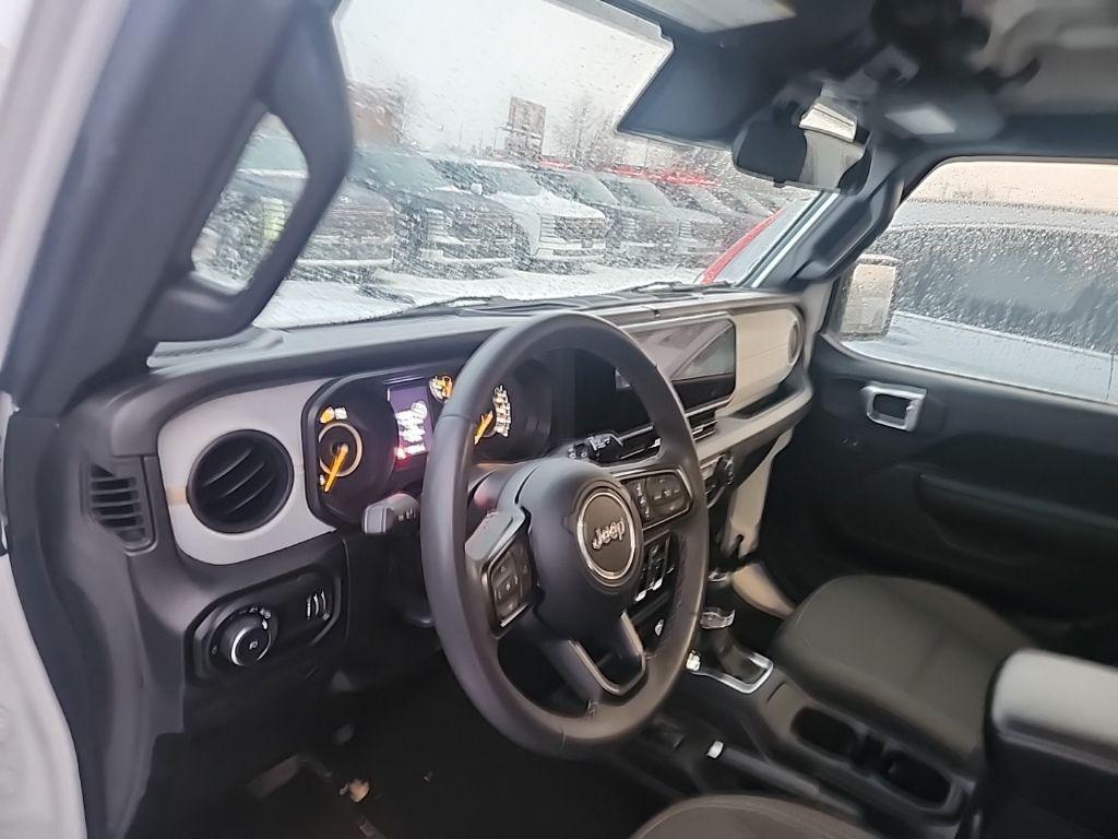 used 2024 Jeep Wrangler car, priced at $30,000