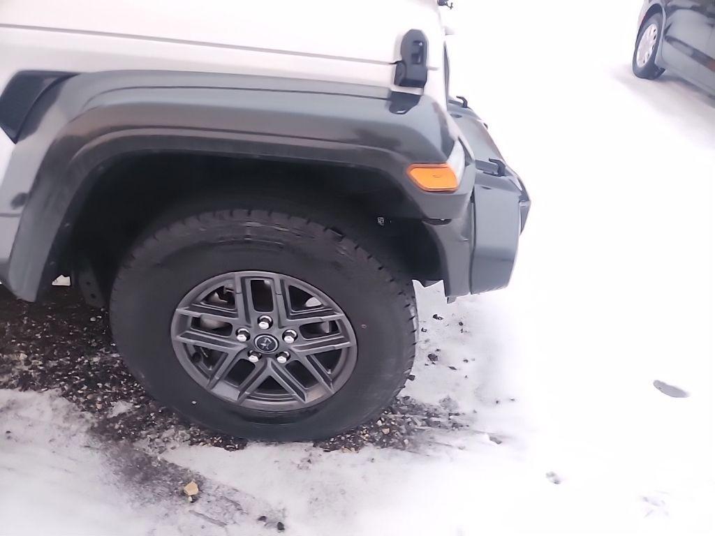 used 2024 Jeep Wrangler car, priced at $30,000