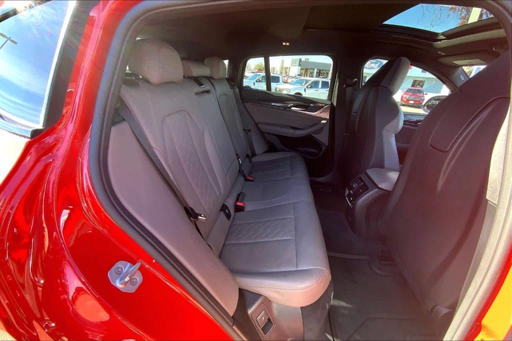 used 2024 BMW X4 M car, priced at $60,202
