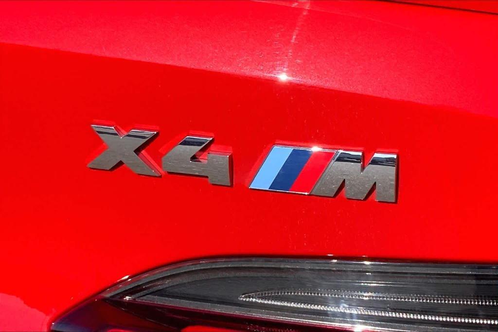 used 2024 BMW X4 M car, priced at $60,202