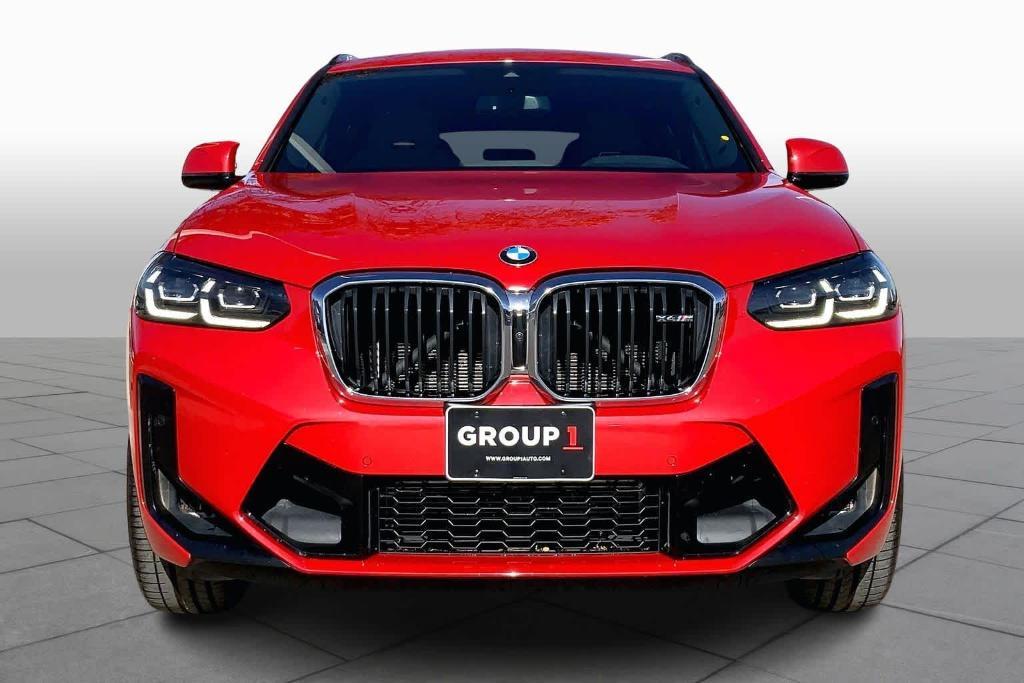 used 2024 BMW X4 M car, priced at $60,202