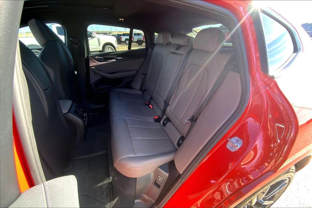 used 2024 BMW X4 M car, priced at $60,202