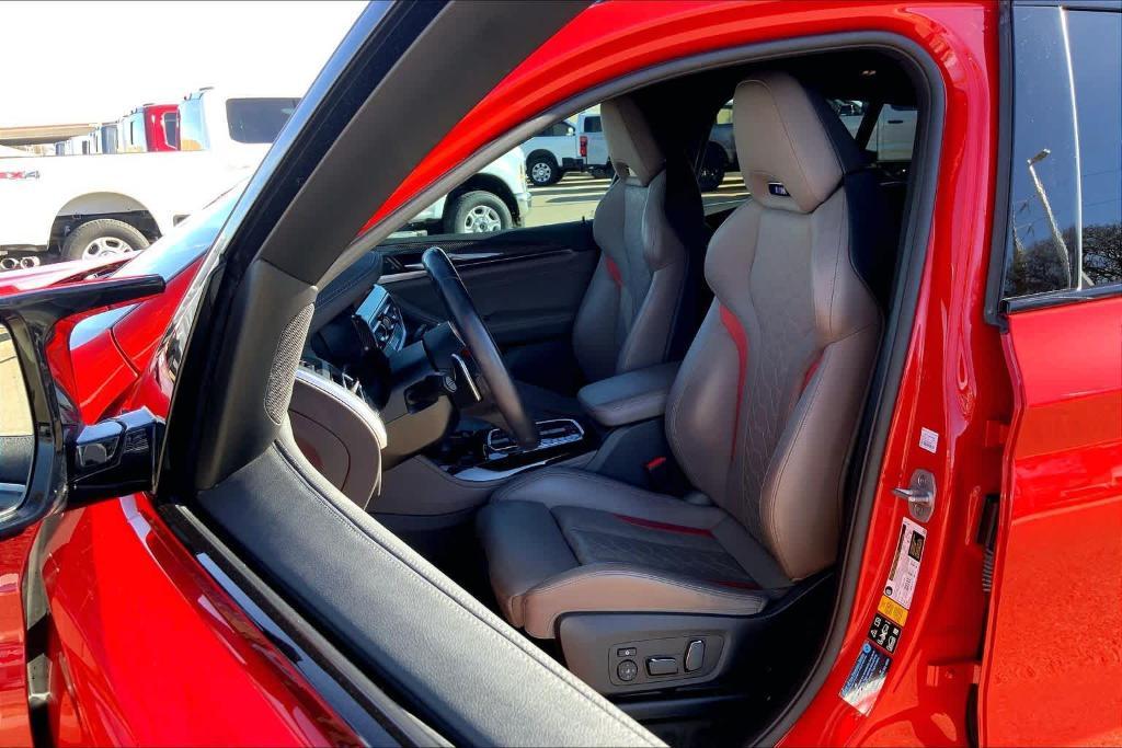 used 2024 BMW X4 M car, priced at $60,202