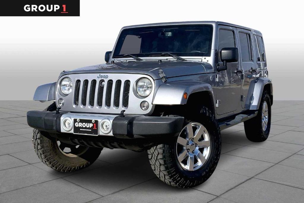 used 2015 Jeep Wrangler Unlimited car, priced at $16,265
