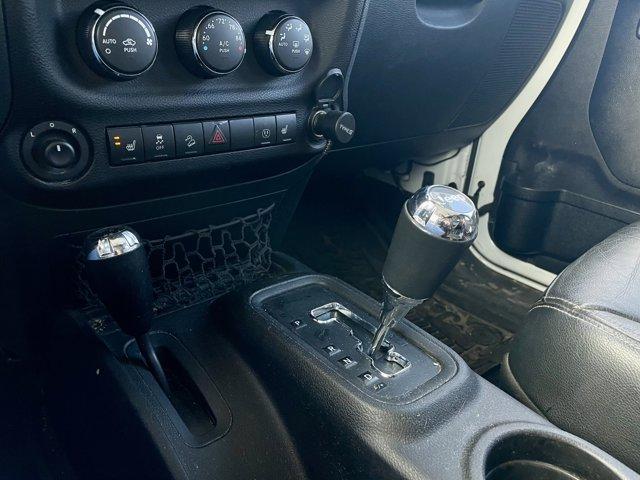 used 2015 Jeep Wrangler Unlimited car, priced at $21,977