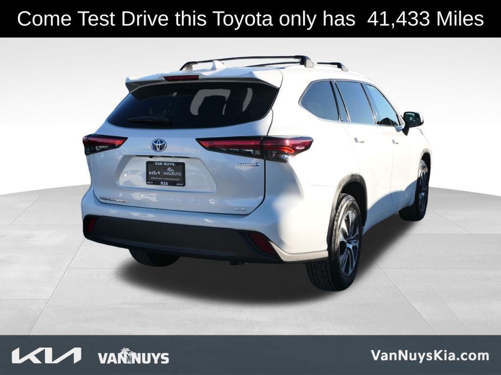 used 2022 Toyota Highlander Hybrid car, priced at $34,588