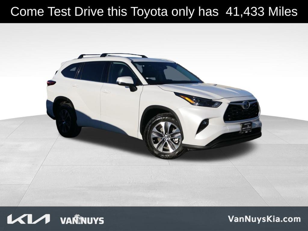 used 2022 Toyota Highlander Hybrid car, priced at $34,588