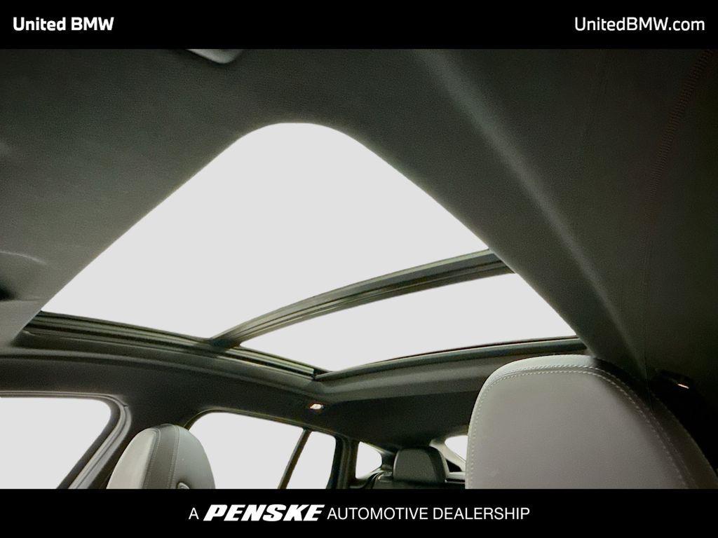 used 2025 BMW X4 car, priced at $52,495