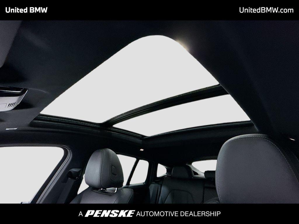used 2025 BMW X4 car, priced at $52,393