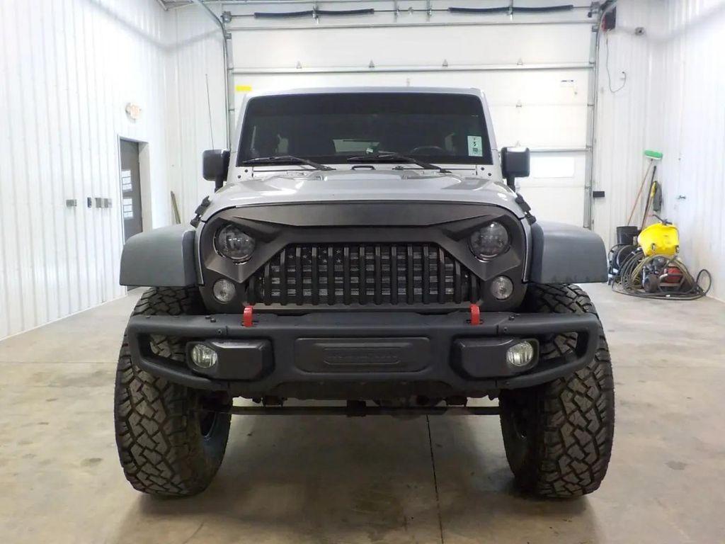 used 2014 Jeep Wrangler Unlimited car, priced at $23,999