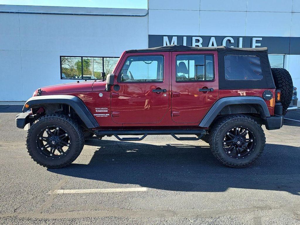 used 2011 Jeep Wrangler Unlimited car, priced at $14,485