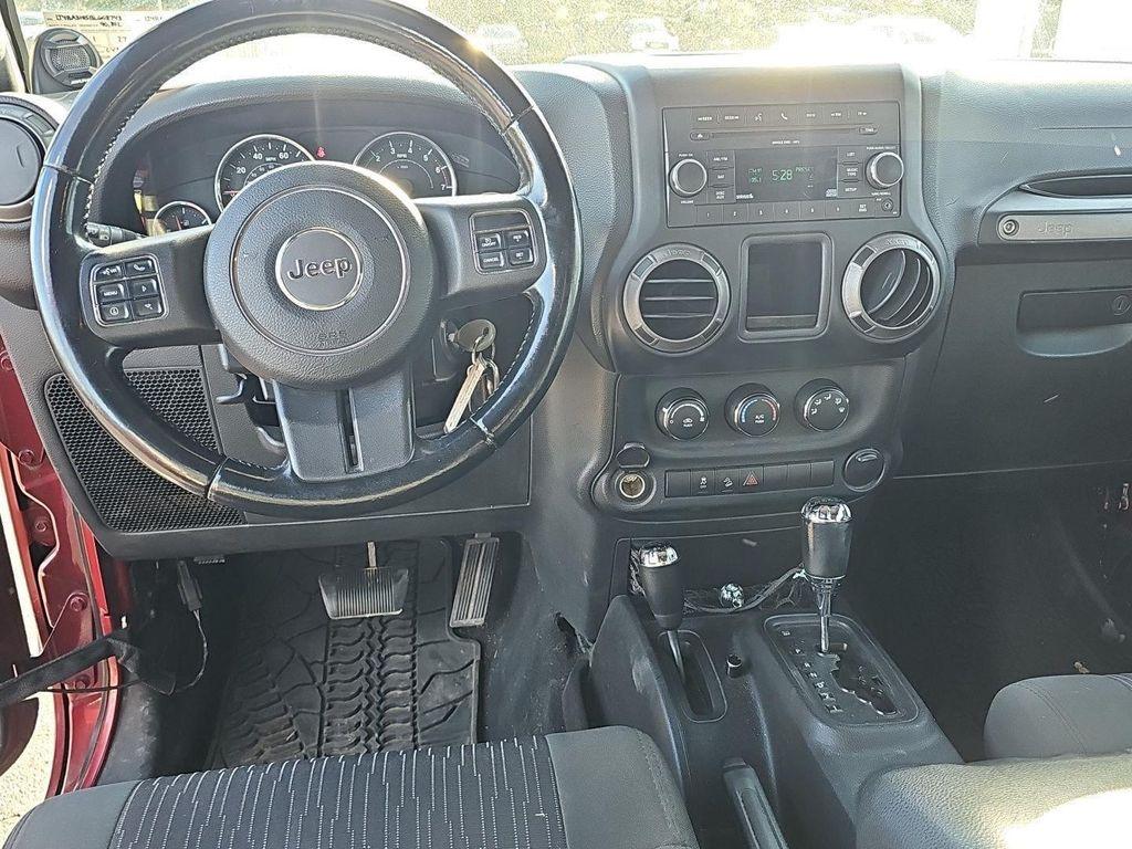 used 2011 Jeep Wrangler Unlimited car, priced at $14,485