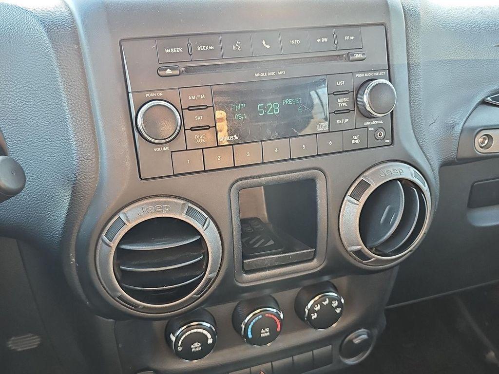 used 2011 Jeep Wrangler Unlimited car, priced at $14,485