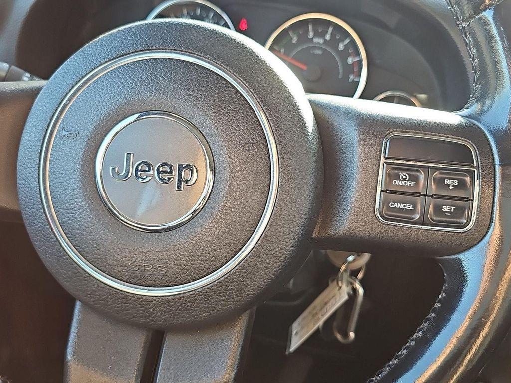 used 2011 Jeep Wrangler Unlimited car, priced at $14,485