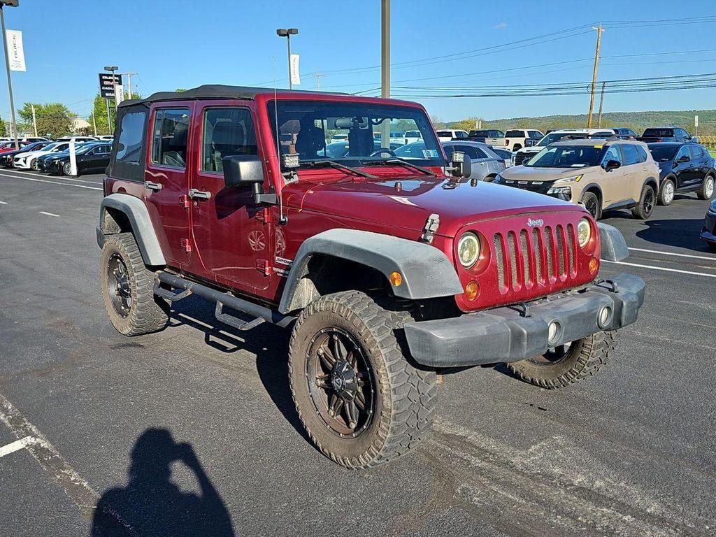 used 2011 Jeep Wrangler Unlimited car, priced at $14,485