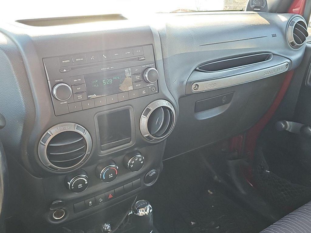 used 2011 Jeep Wrangler Unlimited car, priced at $14,485
